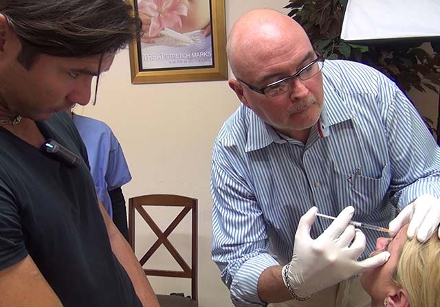 Physician Instructor Supervising Botox Injections of Attendee